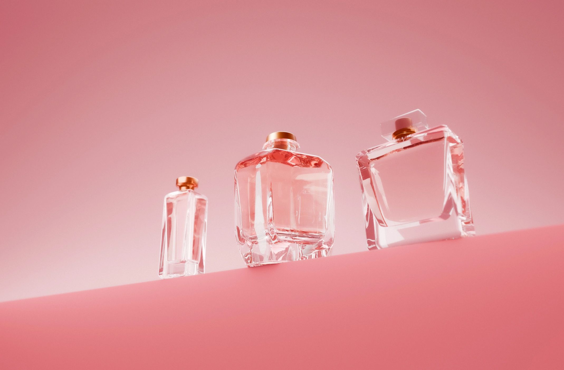 Elegant perfume bottles displayed on a boutique shelf